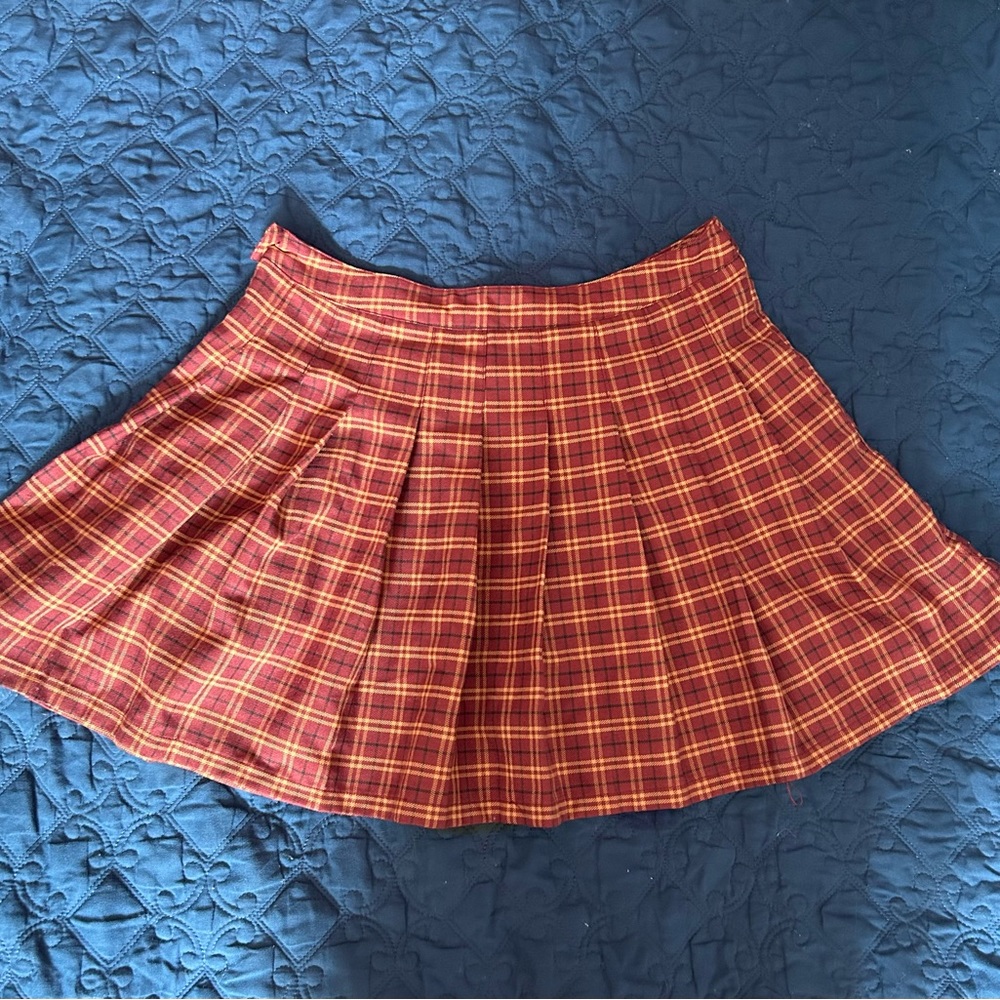 Red and Gold Mini School Skirt

Size: Medium
Lightly Worn